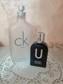 Coppia di bottiglie di profumo vuote di marca