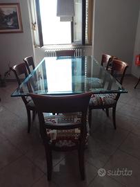 Tavolo in travertino con piano in vetro e 6 sedie