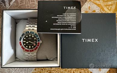 timex q gmt quartz swiss movt