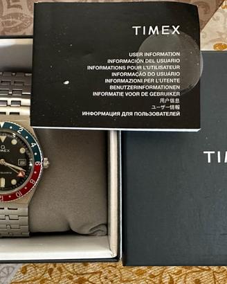 timex q gmt quartz swiss movt