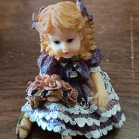 Statuetta rappresentante bambina 