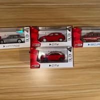 Lotto di 4 modellini Mondo Motors 1:43