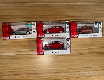 Lotto di 4 modellini Mondo Motors 1:43