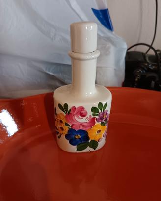 Vasetto di porcellana decorato con tappo