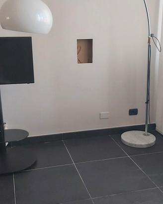 Lampada piantana ad arco