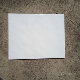 Piastrelle per rivestimenti bianche 30x25 cm.