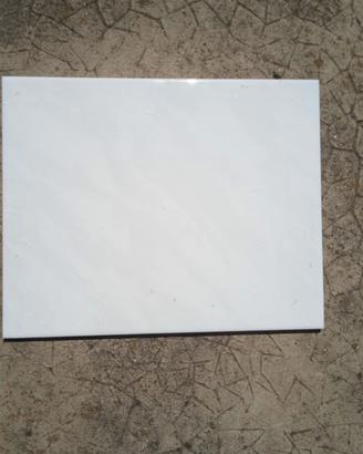 Piastrelle per rivestimenti bianche 30x25 cm.