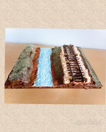 Diorama ferroviario con fiume