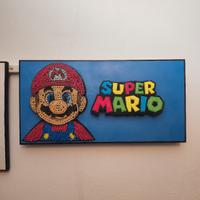 Super Mario realizzato con viti su faggio