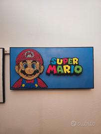 Super Mario realizzato con viti su faggio