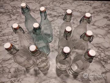 12 bottiglie acqua e 2 portabottiglie