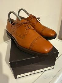 Scarpe di pelle con lacci per donna