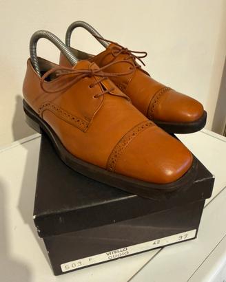 Scarpe di pelle con lacci per donna