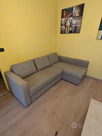 Divano letto con isola contenitore