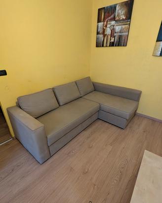 Divano letto con isola contenitore