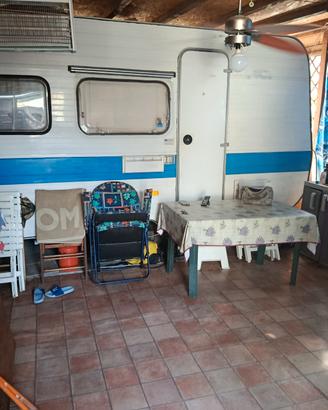 roulotte con struttura fissa