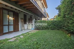 TRILOCALE CON GIARDINO IN RESIDENCE CON PISCINA