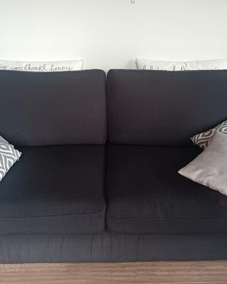 divano molto comodo colore nero, marca Prima fila 