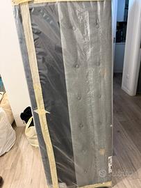 Testata letto matrimonuale in tessuto grigio