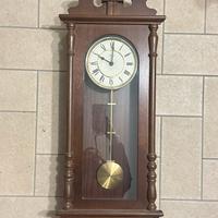 Orologio a pendolo da muro