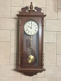 Orologio a pendolo da muro