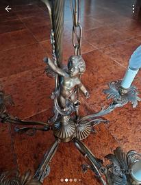 Lampadario vintage con puttino