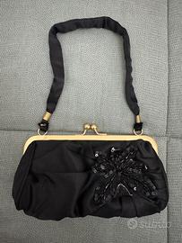 Pochette nera e oro