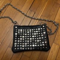 Borsa in gomma con borchie