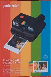 polaroid instant camera + 16 pellicole
