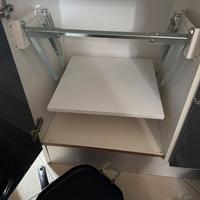 Porta affettatrice a scomparsa.