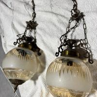 Lampadario in vetro e ferro battuto