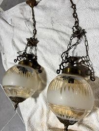 Lampadario in vetro e ferro battuto