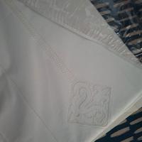 Lenzuola di puro lino ricamate a mano