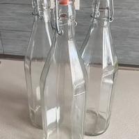 Bottiglie di vetro ciascuna da 1 litro