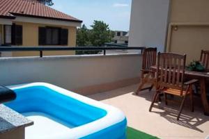 Appartamento in parco con terrazzo box e p. auto