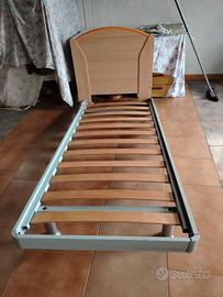 letto singolo e lettino neonato 