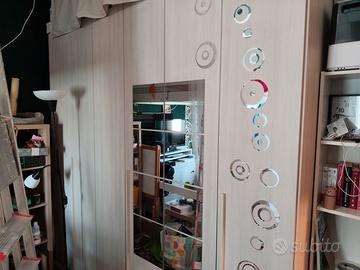 Armadio 6 ante, divano letto, letto contenitore.