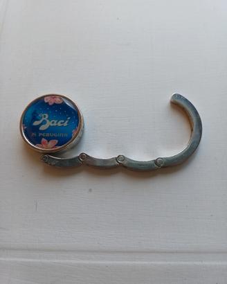 accessorio per appendere la borsa al tavolo Baci