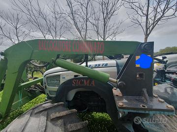 Scuotitore combinato con ombrello marca Sicma.