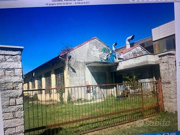 capannone industriale con area edificabile