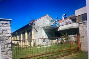 capannone industriale con area edificabile