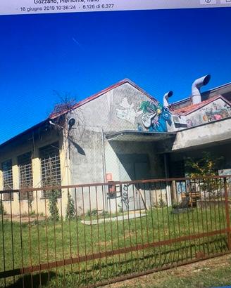 capannone industriale con area edificabile