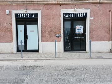 Negozio con 2 vetrine e canna fumaria