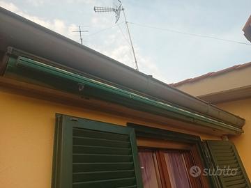 Tenda ombreggiante a molla colore giallo-verde