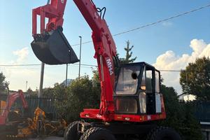 E142 - ESCAVATORE O&K MH4