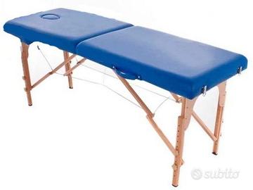 Lettino pieghevole blu per massaggi.