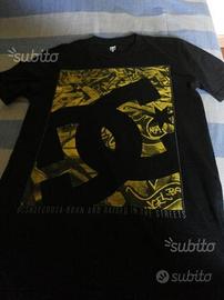 T shirt DC taglia xs ben tenuta