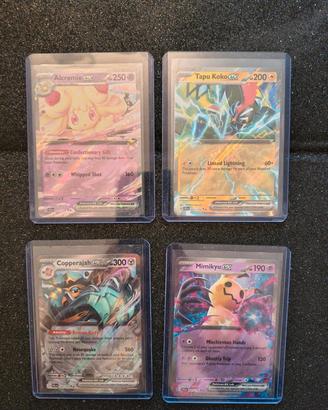 Lotto Pokémon Premium: 4 Carte in Top Loader -