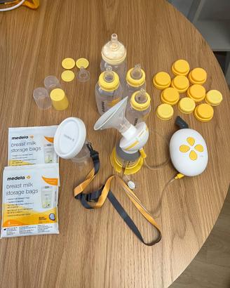 Tiralatte elettrico solo MEDELA + biberon buste