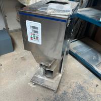 Riempitrice automatica per polveri e granuli